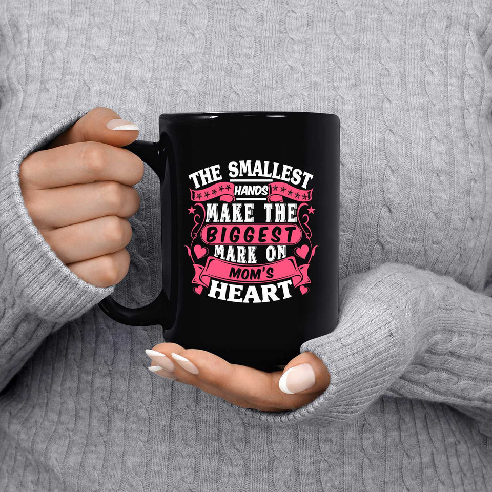 The Smallest Hands Make The Biggest Mark On Mom's Heart - 15 Oz Coffee Mug Black