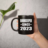 Bookkeeper Since 2023 - 11oz Coffee Mug Black