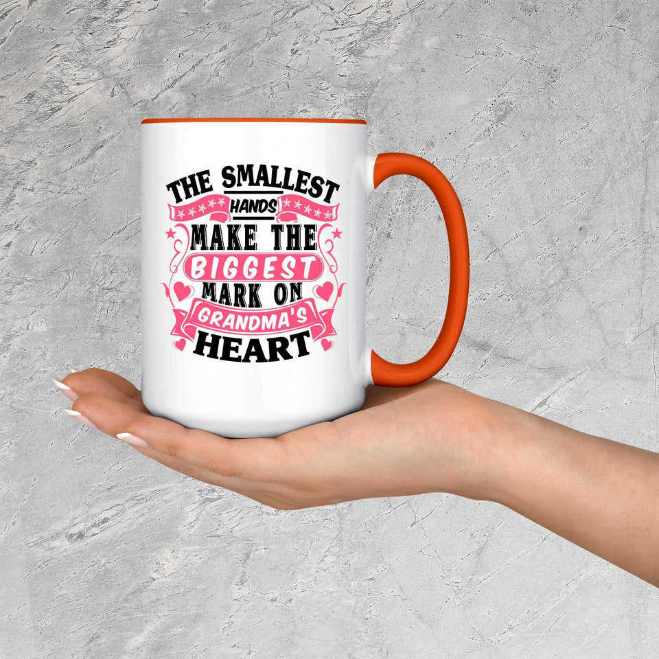 The Smallest Hands Make The Biggest Mark On Grandma's Heart - 15oz Accent Mug Orange