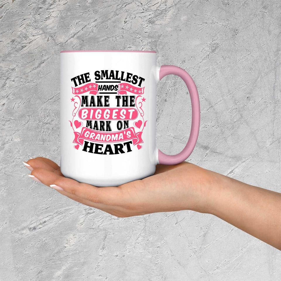 The Smallest Hands Make The Biggest Mark On Grandma's Heart - 15oz Accent Mug Pink