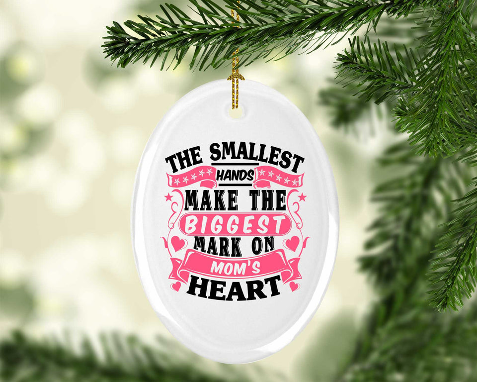 The Smallest Hands Make The Biggest Mark On Mom's Heart - Oval Ornament