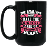 The Smallest Hands Make The Biggest Mark On Grandma's Heart - 15 Oz Coffee Mug Black